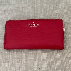 kate spade New York bright red zip-around continental wallet